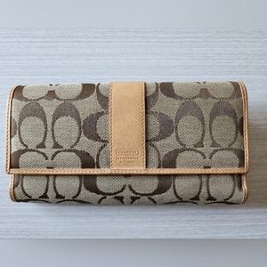 Gently used‎ Coach tri-fold canvas wallet